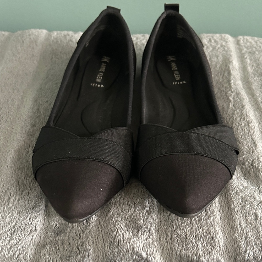 Anne Klein Black Flats with Cross Strap Design